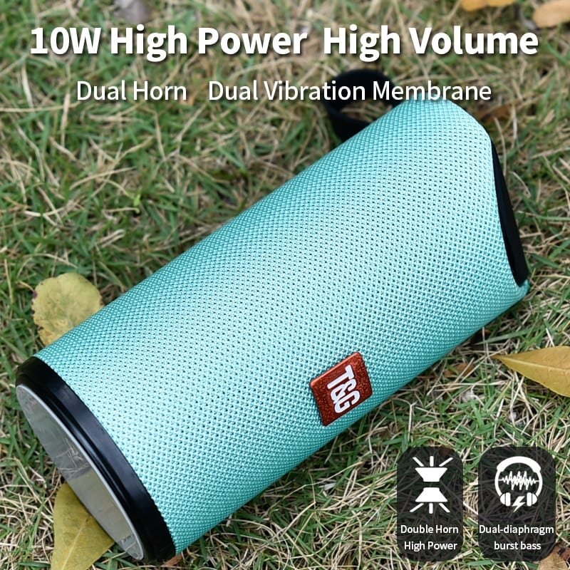 Teal Bluetooth speaker with T&G logo on grass