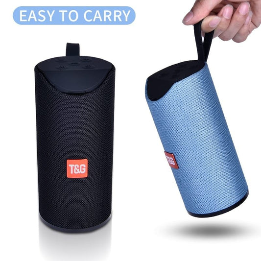 Black and blue portable speakers with carrying handles on a white background